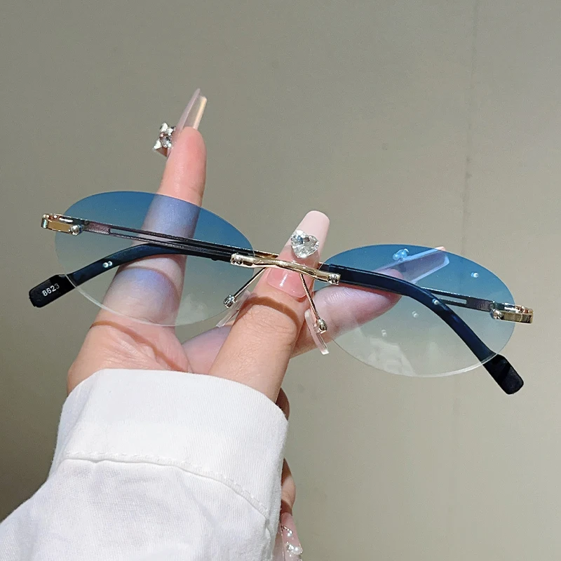 フレームレスのオーバル型サングラス。女性向け、グラデーション - Designer Sunglasses のレビューと価格